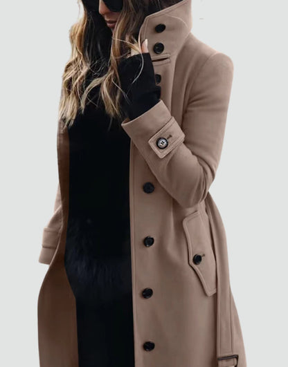 Women's Homixa fitted winter coat with high collar, button front and side pockets, tailored for a sleek, warm winter look.