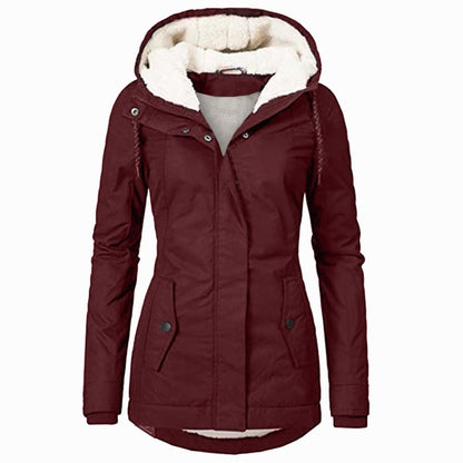 Women's fleece-lined parka by Homixa with drawstring hood, curved hem, and flap pockets, suitable for cold weather.