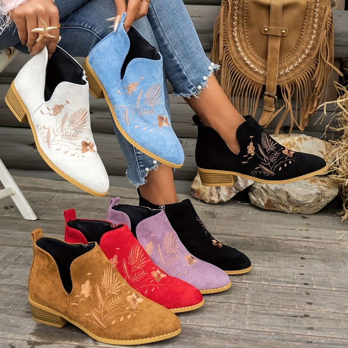 Women's floral-embroidered pointed-toe booties by Homixa featuring a low block heel and V-cut opening.