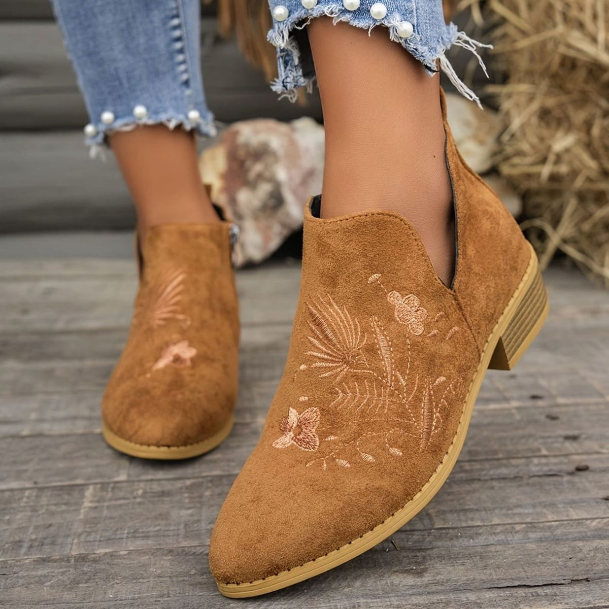 Women's floral-embroidered pointed-toe booties by Homixa featuring a low block heel and V-cut opening, stylish and comfortable footwear.