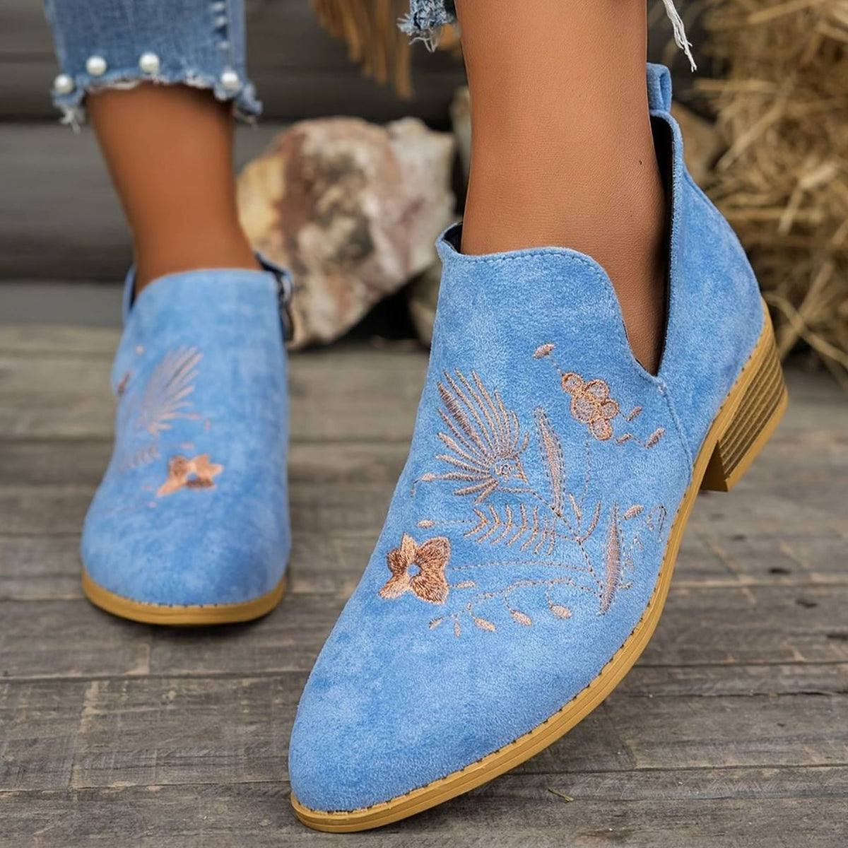 Women's floral-embroidered pointed-toe booties with low block heel and V-cut opening by Homixa, showcasing intricate embroidery and stylish design.