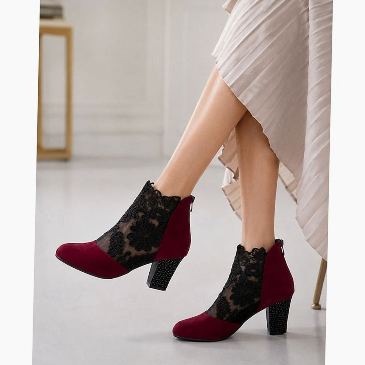 Women's floral lace-accent booties by Homixa with block heel and back-zip closure, featuring delicate lace detail and stylish design.
