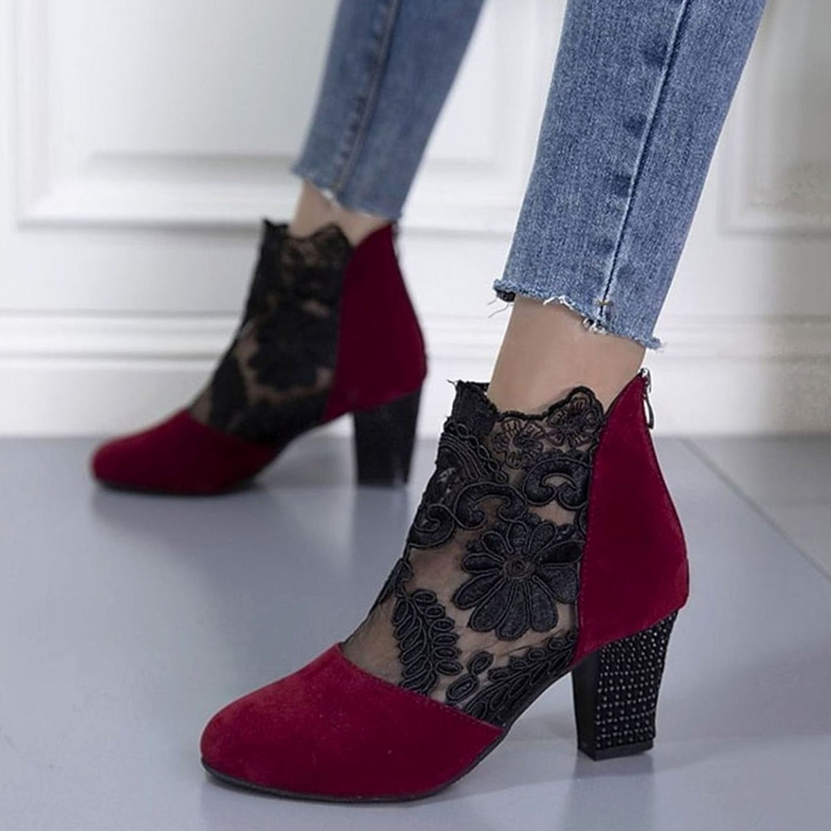 Women's floral lace-accent booties with block heel and back-zip closure by Homixa, showcasing intricate lace details and stylish design.