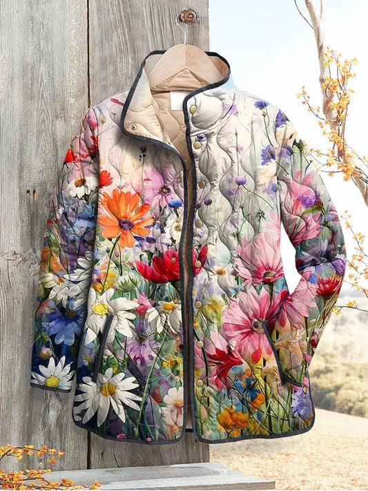 Women's floral quilted jacket by Homixa featuring snap-front closure and contrast piping, shown on a model.