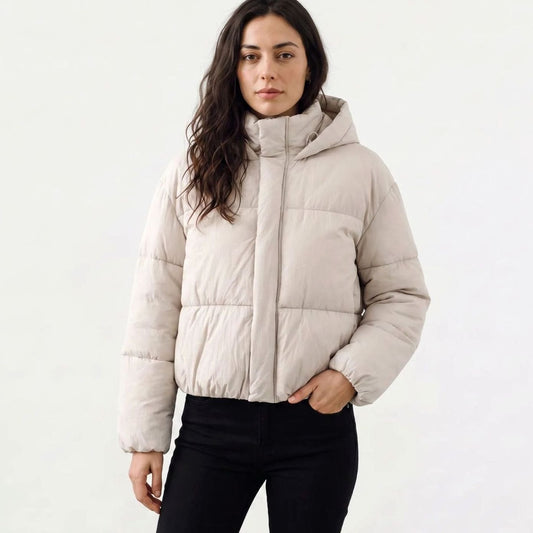 Women's Homixa full-zip cropped puffer jacket with hood, boxy fit, and quilted shell, displayed on a model.