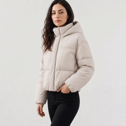 Women's Homixa full-zip cropped puffer jacket with hood, boxy fit, and quilted shell, displayed on a model.