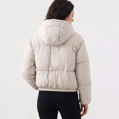 Homixa women's full-zip cropped puffer jacket with hood, boxy fit, and quilted shell, displayed on a model.