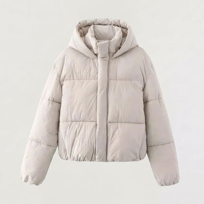 Women's Homixa full-zip cropped puffer jacket with hood, boxy fit, and quilted shell, shown on a model.