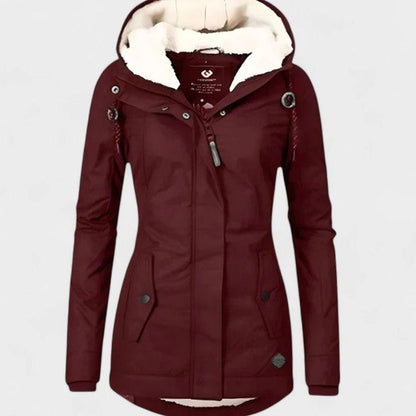 Homixa women's full-zip hooded winter jacket with slim fit and soft fleece lining, shown on a model outdoors.