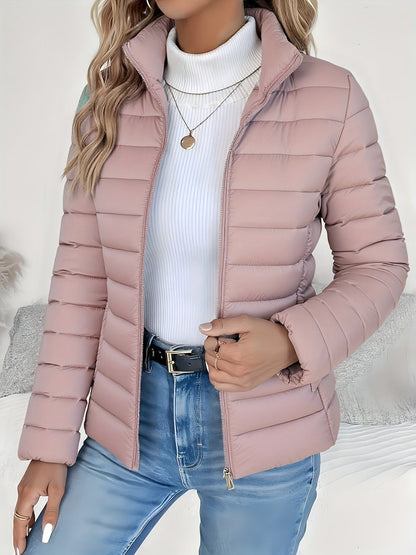 Women's quilted winter jacket by Homixa with full zip, slim fit, and stand collar, shown on a model.