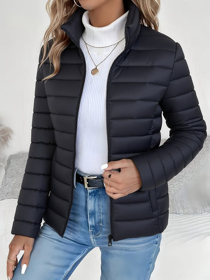 Women's quilted winter jacket by Homixa, full-zip, slim fit with stand collar, showcasing stylish outerwear for cold weather.