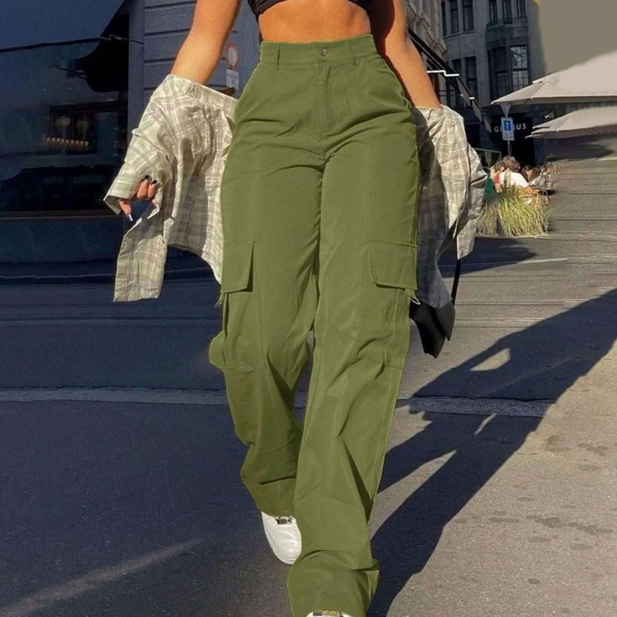 Women's high-waist wide-leg cargo pants by Homixa with functional flap thigh pockets and a relaxed fit.