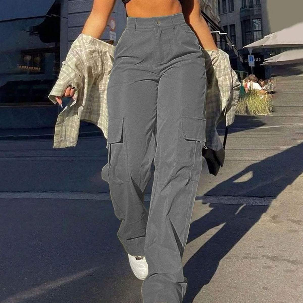 Women's high-waist wide-leg cargo pants by Homixa with functional flap thigh pockets, shown in a relaxed fit style.