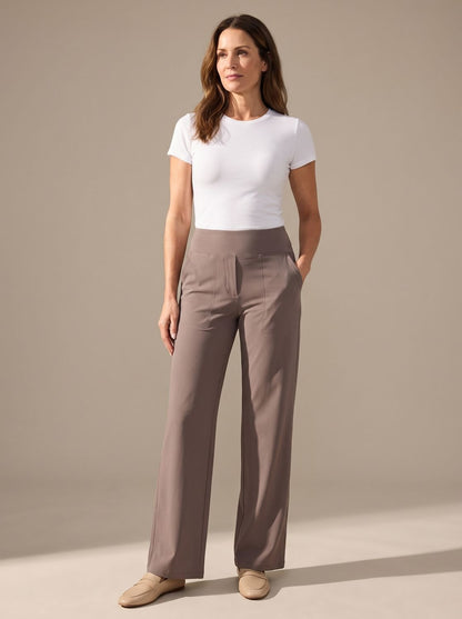 Women's high-waist wide-leg palazzo pants by Homixa with elastic waistband and side pockets, flowing fabric and relaxed fit.