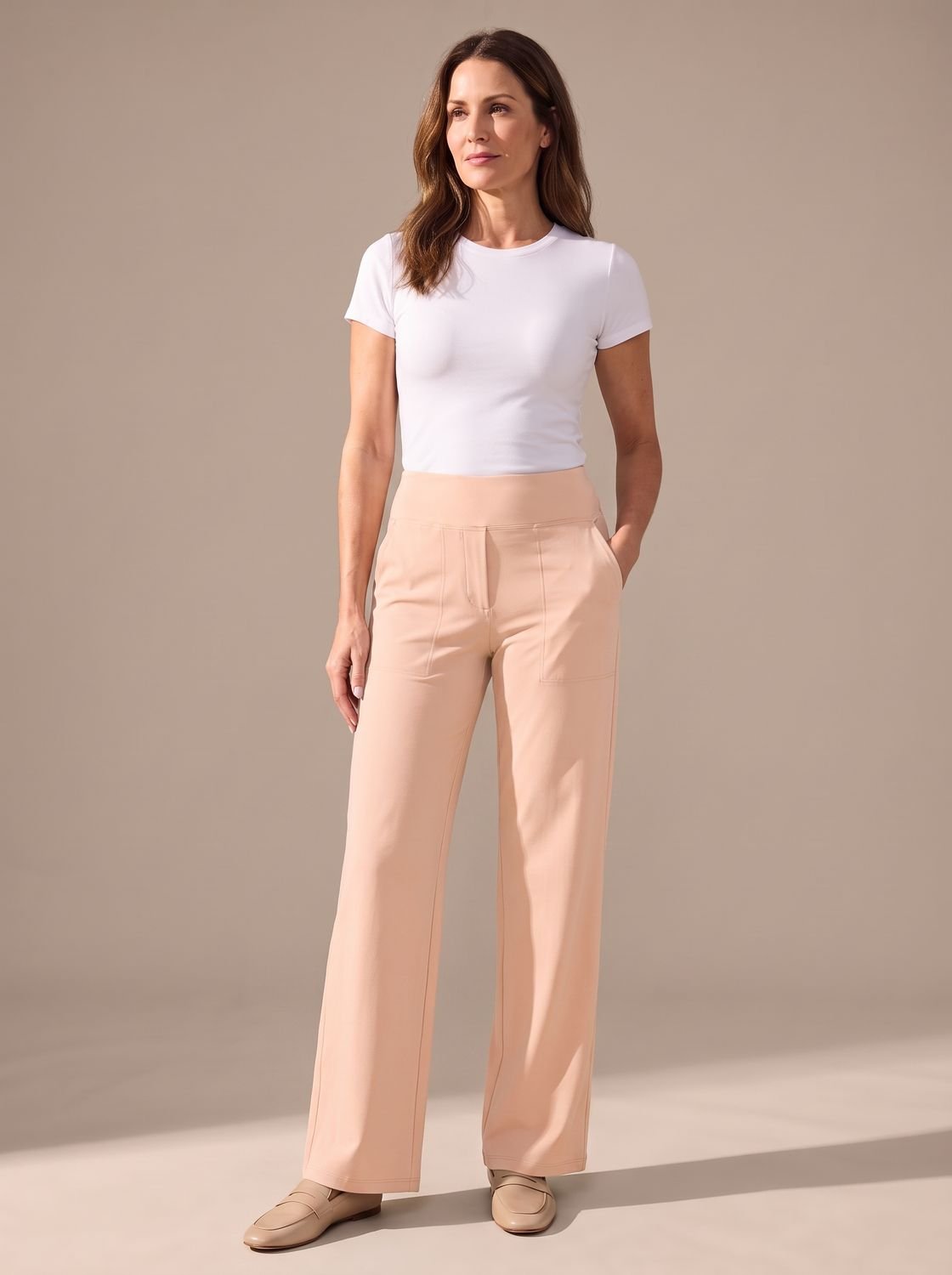 Women's high-waist wide-leg palazzo pants with elastic waistband and pockets, stylish and comfortable for casual wear.