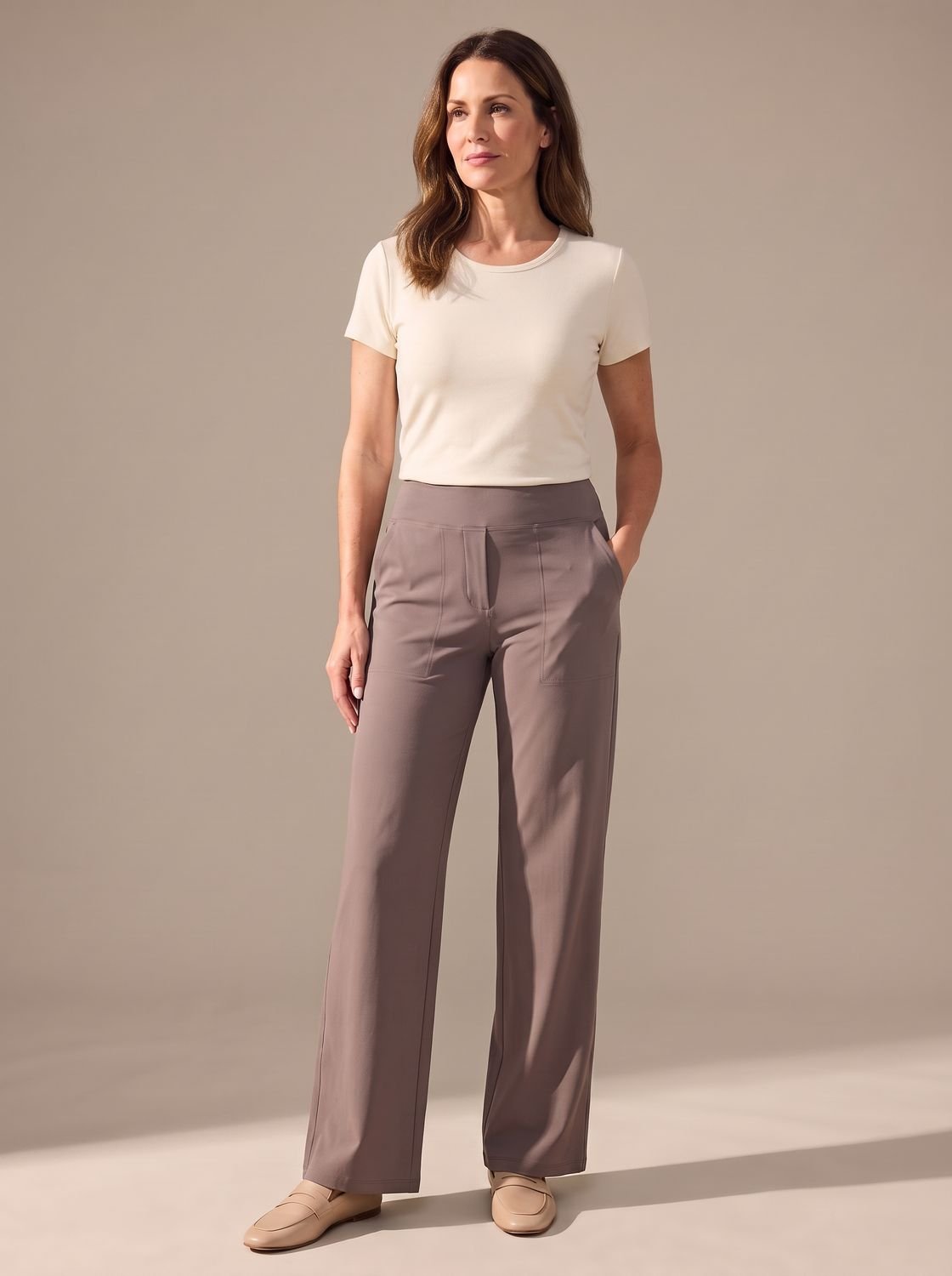 Women's high-waist wide-leg palazzo pants with elastic waistband and pockets by Homixa, showing the relaxed fit and flowing fabric.