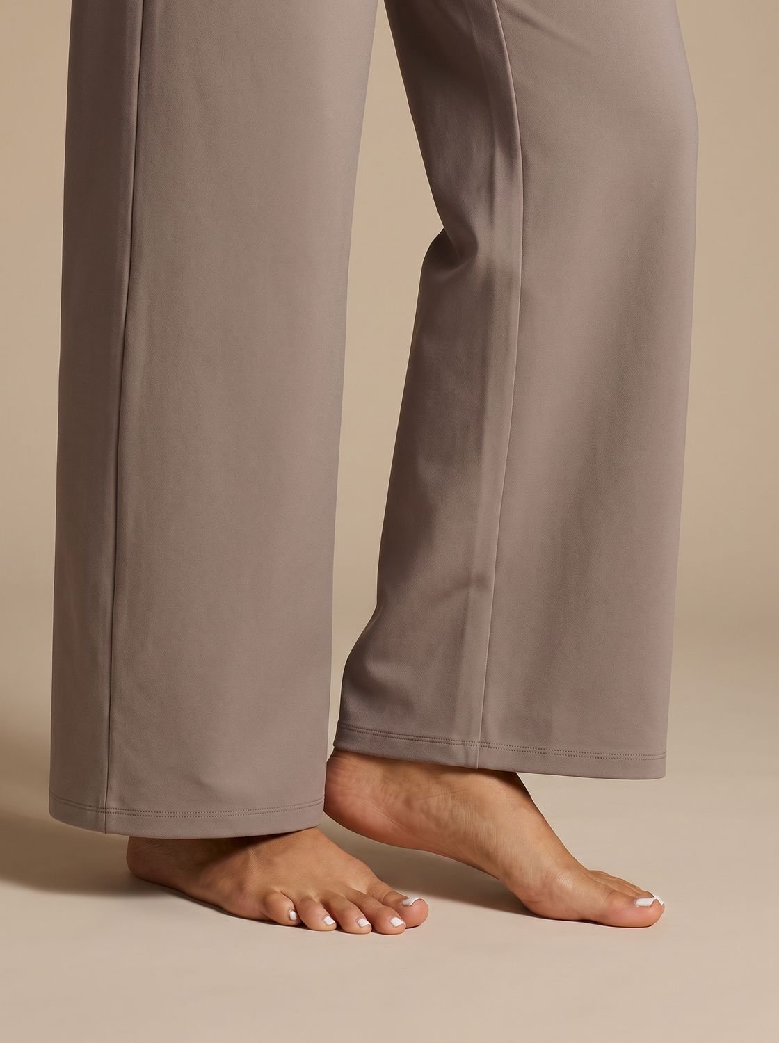 Women's high-waist wide-leg palazzo pants by Homixa with elastic waistband and side pockets, flowing fabric and relaxed fit.