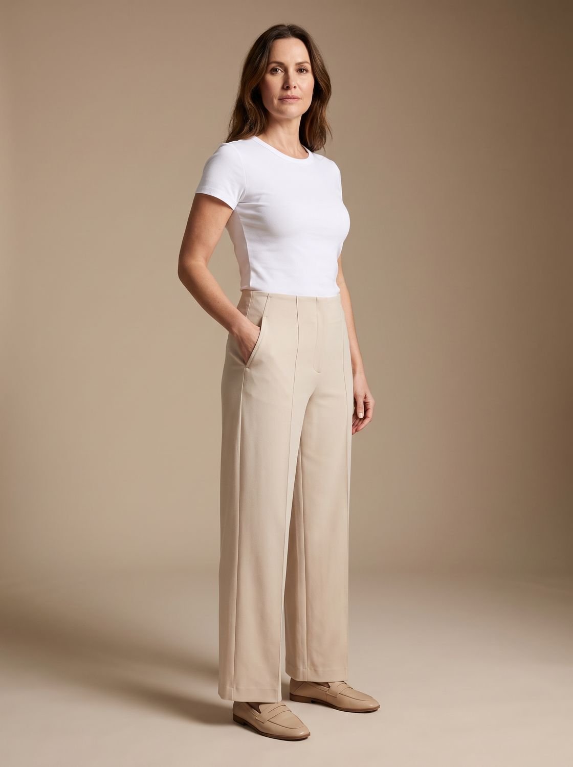 Women’s high-waist wide-leg palazzo pants by Homixa with elastic waistband and side pockets, shown on a model.