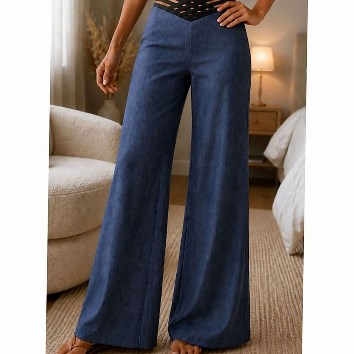 Homixa women's high-waist wide-leg pants with crossover waistband and flowing legs, displayed on a model.