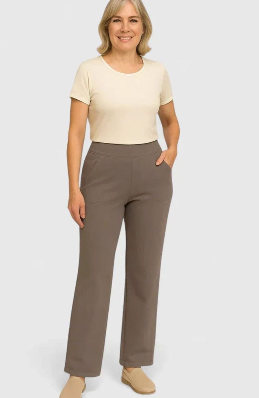 Homixa women's high-waist wide-leg trousers with elastic waistband and deep side pockets, shown on a model.