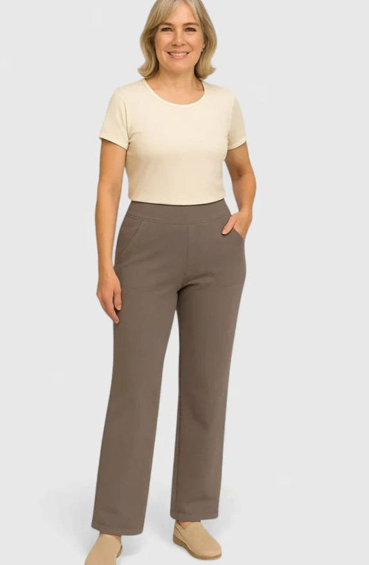 Homixa women's high-waist wide-leg trousers with elastic waistband and deep side pockets, shown on a model.