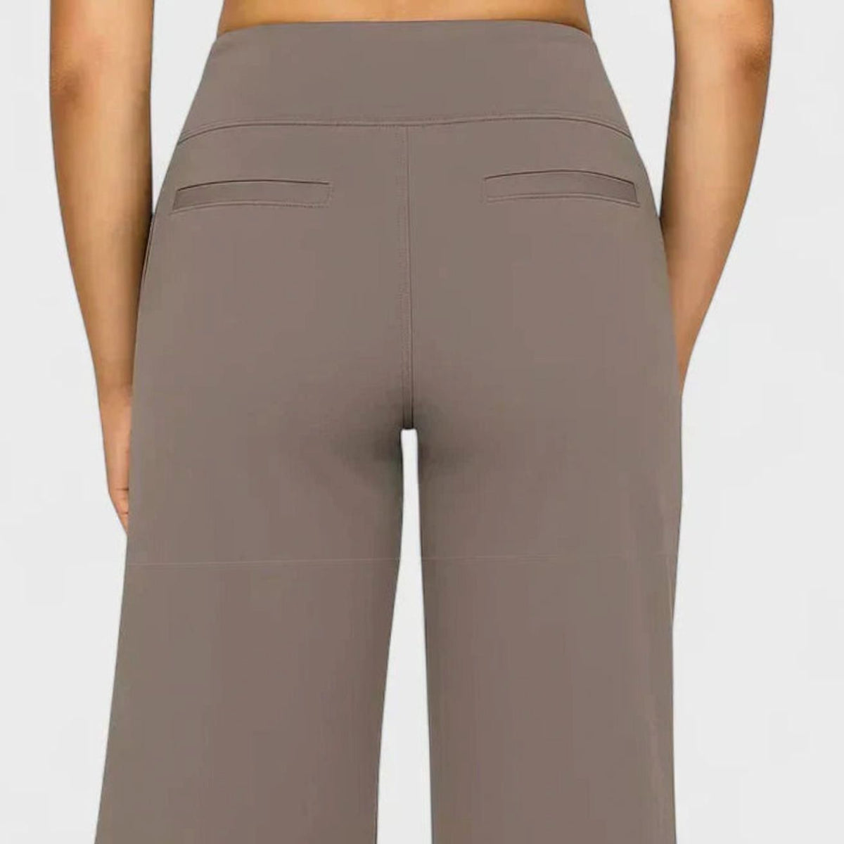 Homixa women's high-waist wide-leg trousers with elasticated waistband and deep side pockets, styled for casual wear.