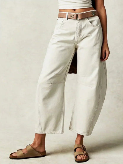 Women’s high-waisted wide-leg jeans with belt loops, front pockets, and a relaxed fit by Homixa, shown on a model.