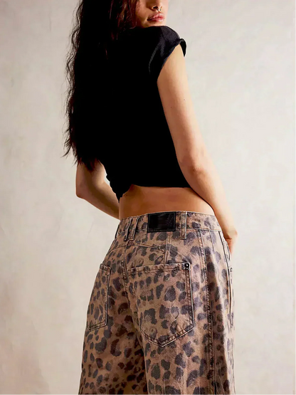 Pair of Homixa women's high-waisted wide-leg jeans with belt loops, front pockets, and a relaxed fit, displayed on a model.