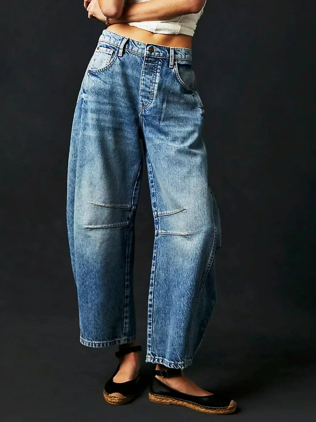 Women’s high-waisted wide-leg jeans by Homixa featuring belt loops, front pockets, and a relaxed fit.