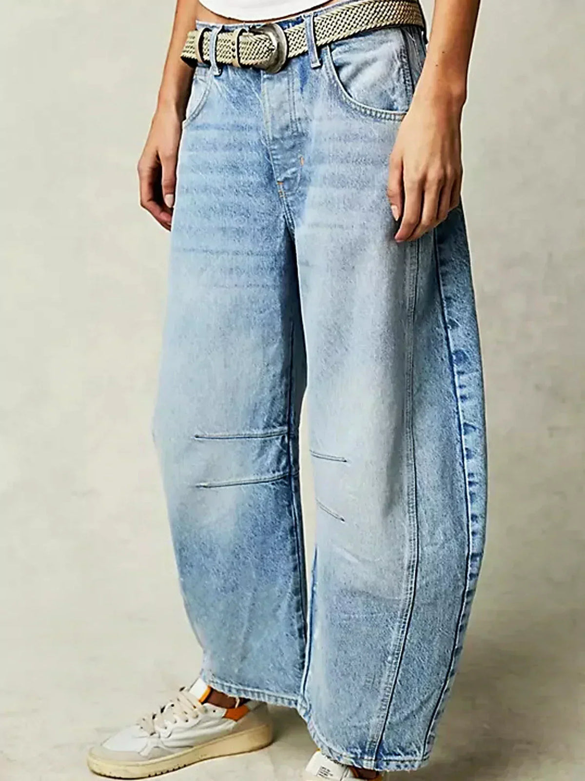 Women's high-waisted wide-leg jeans by Homixa featuring belt loops, front pockets, and a relaxed fit.