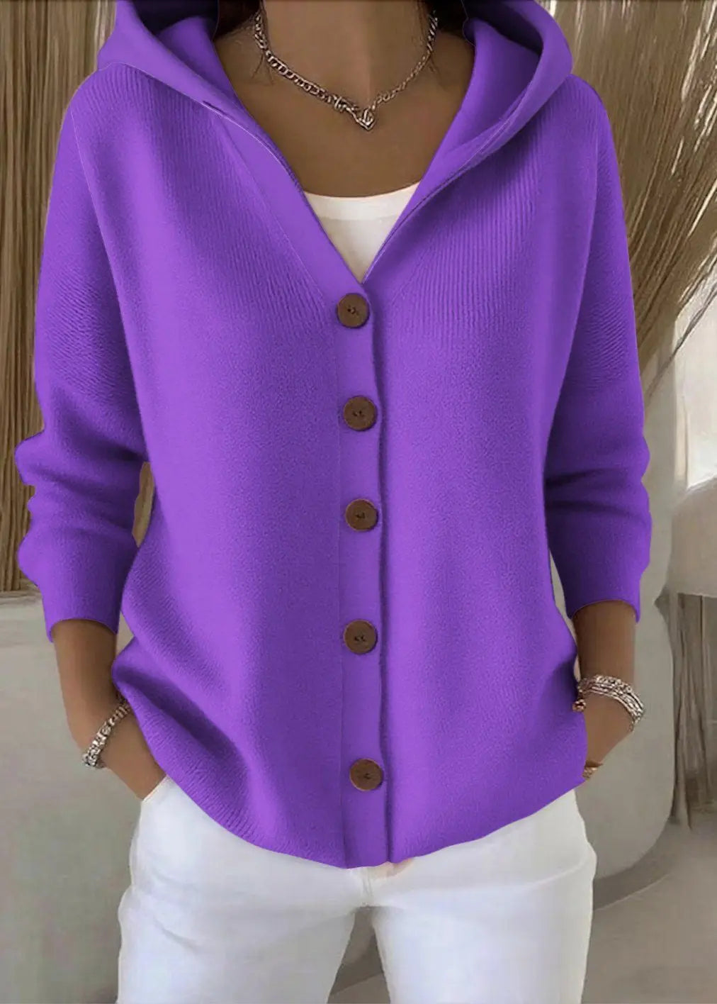 Women's Homixa hooded button-front cardigan with relaxed fit and ribbed hem, shown in a cozy, casual style.
