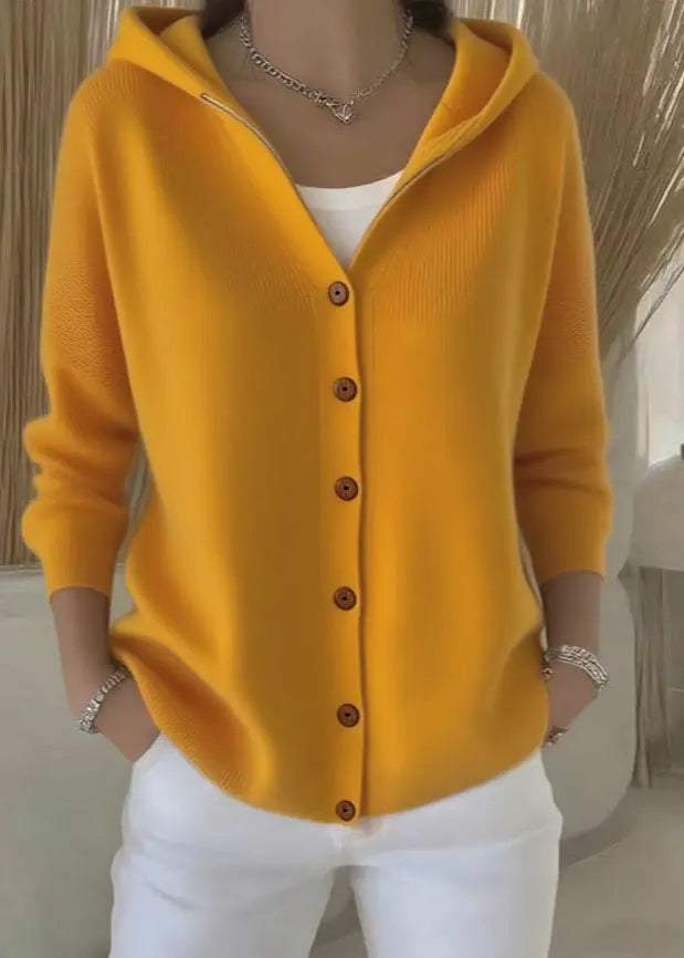 Women's Homixa hooded button-front cardigan with a relaxed fit and ribbed hem, styled on a model in a casual setting.