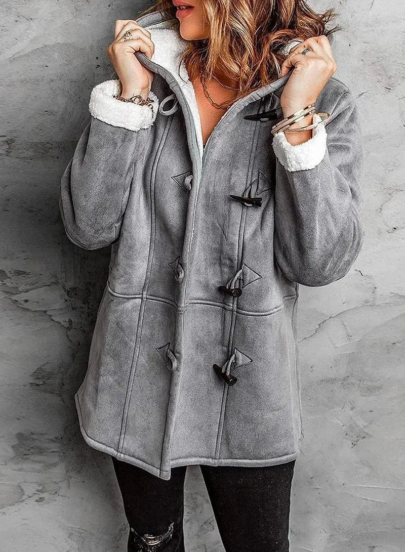 Women's fleece-lined coat with hood by Homixa, tailored fit and spacious for layering, perfect for cold weather.