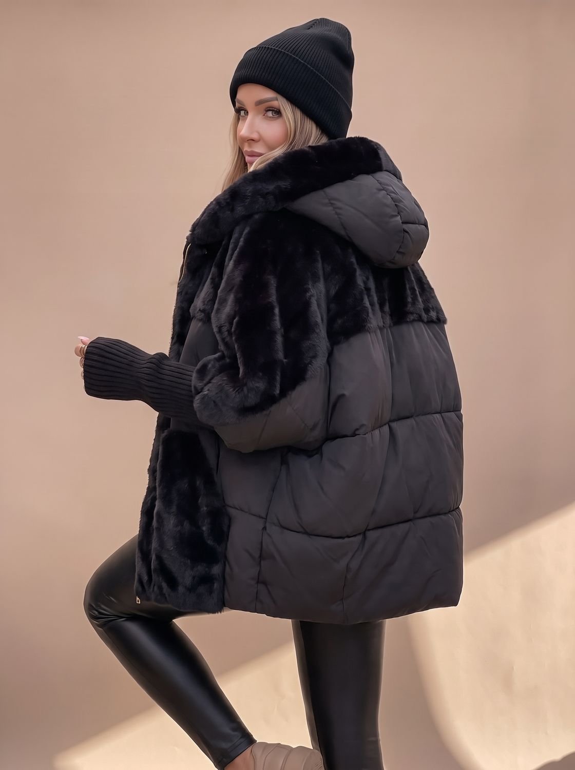 Women's Homixa hooded winter puffer coat with faux-fur panels and quilted body, designed for warmth and style.