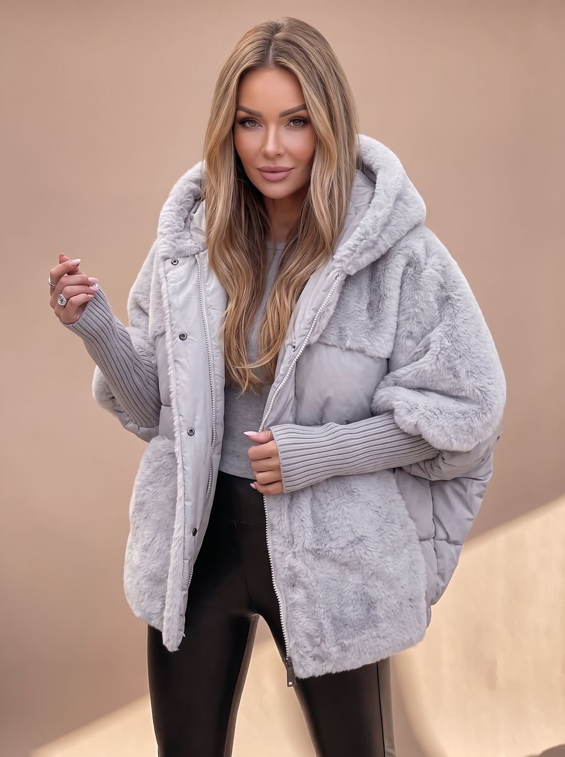 Women's hooded winter puffer coat by Homixa with faux-fur panels and quilted body, designed for warmth and style in cold weather.