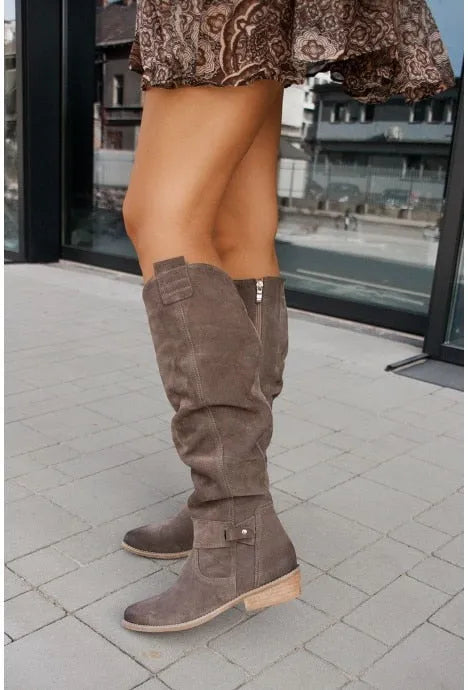 Women's Homixa knee-high boots with side zipper, low block heel, and suede-look finish, showcasing stylish footwear design.