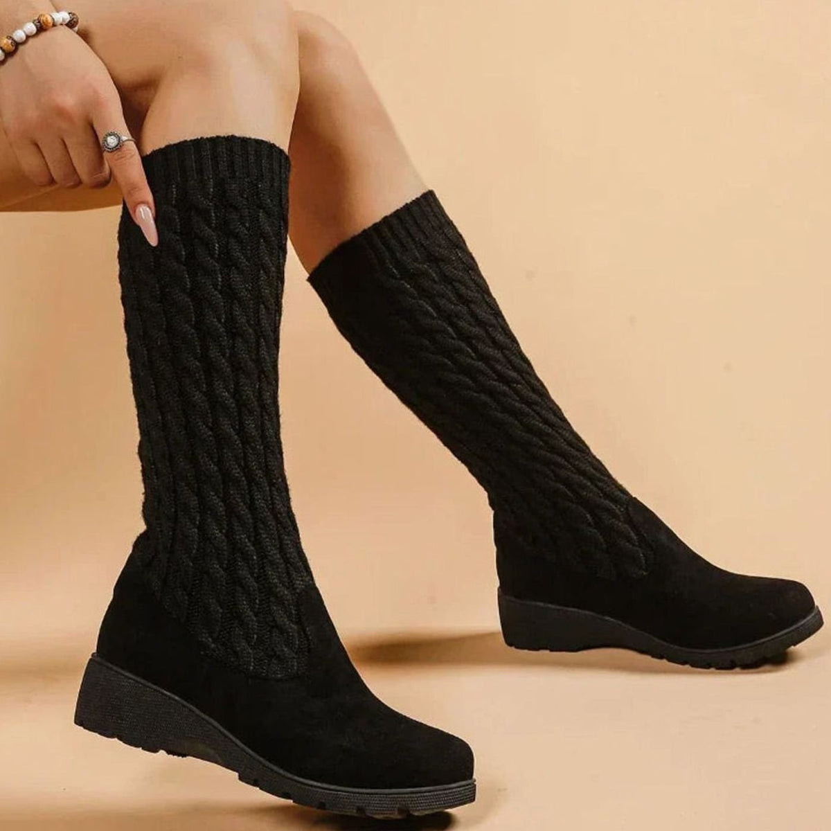 Homixa women's knee-high boots with suede foot, cable-knit shaft, and wedge heel, stylish and warm for winter wear.