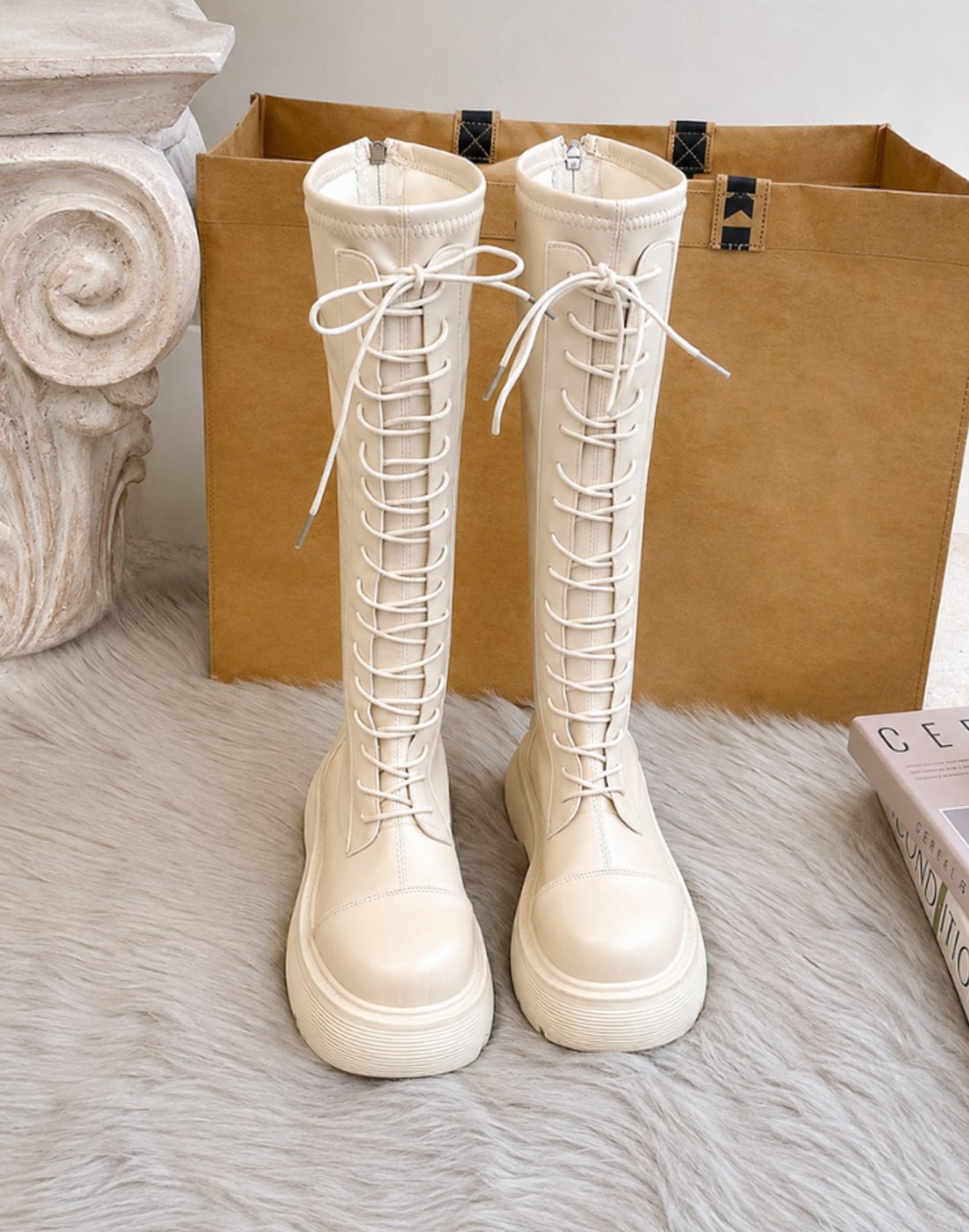 Women's knee-high faux leather boots by Homixa featuring a chunky sole and side zip closure, stylish and durable footwear.