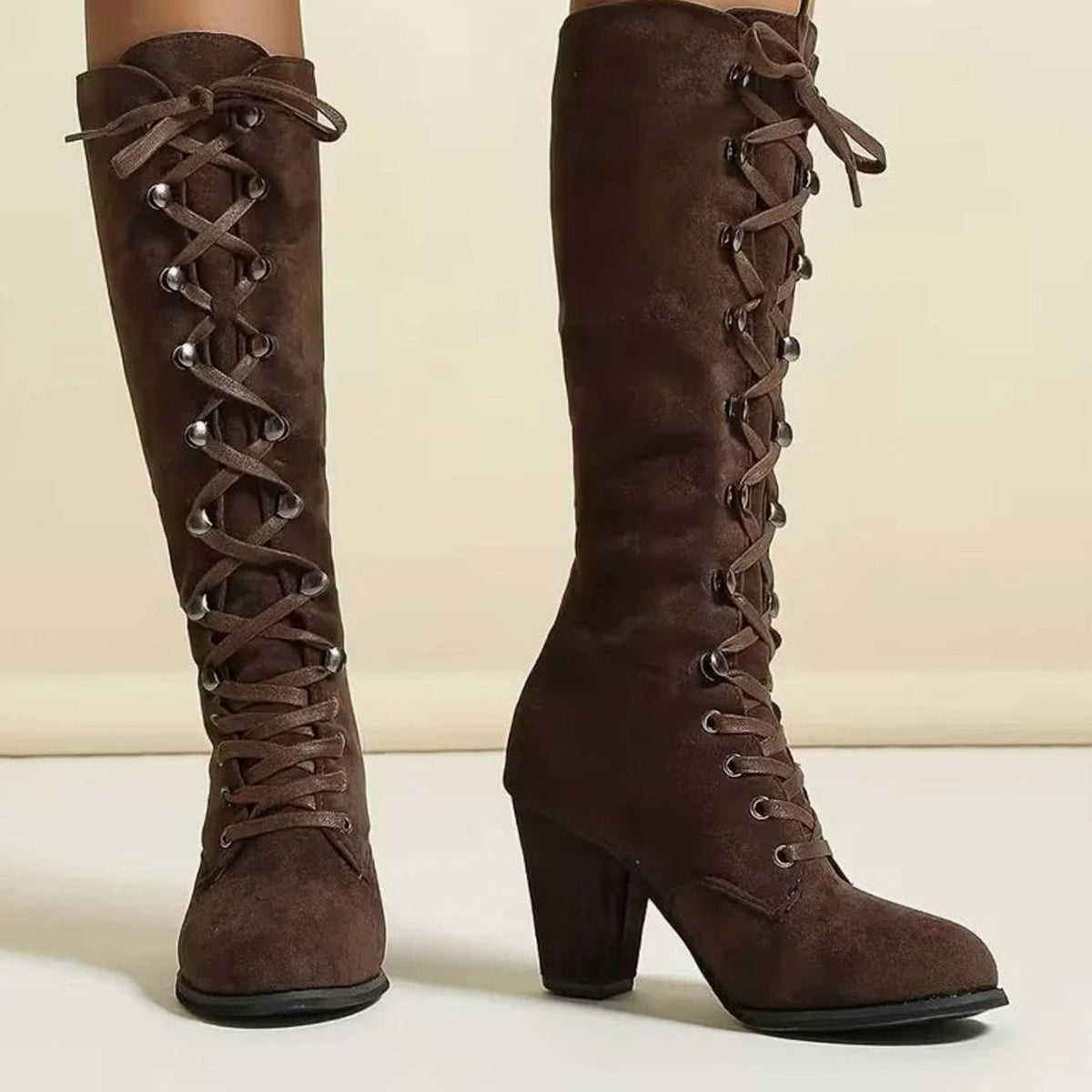 Women's knee-high lace-up boots with round toe and mid-height block heel by Homixa, shown in black leather.
