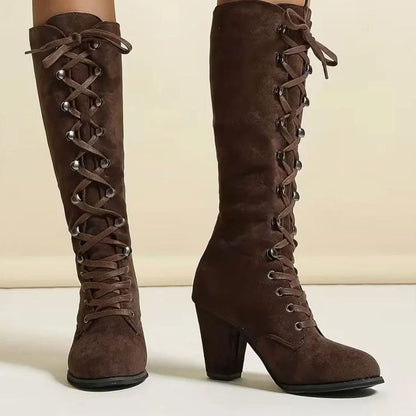 Women's knee-high lace-up boots with round toe and mid-height block heel by Homixa, shown in black leather.