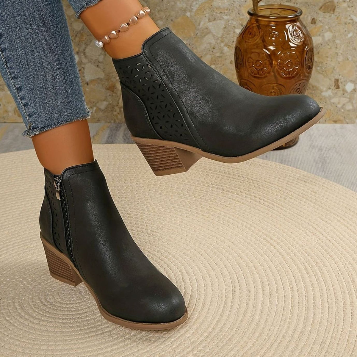 Homixa women's laser-cut booties with floral cutout detail, block heel, and side zipper, stylish and comfortable footwear.