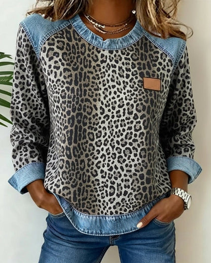 Women's leopard-print patchwork sweatshirt by Homixa with denim-look raglan panels and cuffs, cozy and stylish pullover sweater.