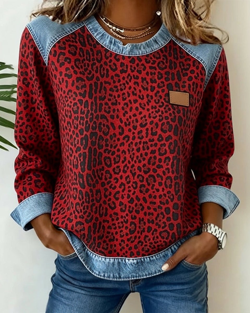 Women's leopard-print patchwork sweatshirt by Homixa featuring denim-look raglan panels and cuffs.