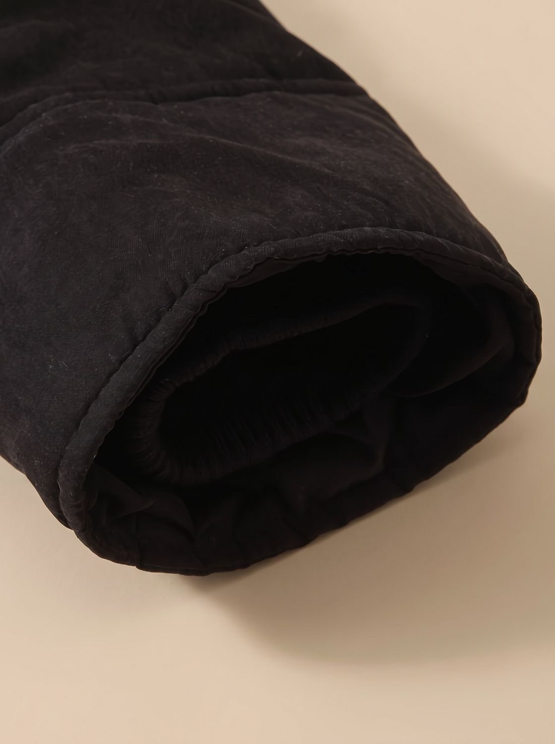 Women’s Homixa winter parka with sherpa collar, drawstring waist, and front pockets, shown in a cozy lined winter coat style.