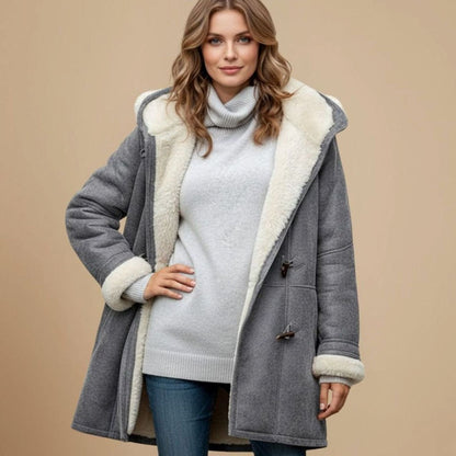 Women’s long hooded winter duffle coat by Homixa with toggle buttons, regular fit, and cozy warm fabric.