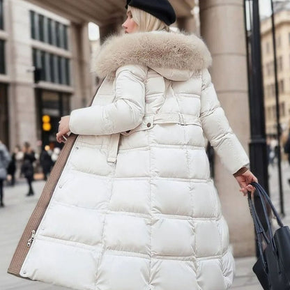 Women's long Homixa winter parka with hood, water- and wind-repellent outer shell, designed for cold weather comfort