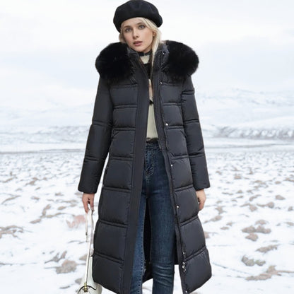 Women's long winter parka by Homixa with hood, water- and wind-repellent outer shell, ideal for cold, wet weather.