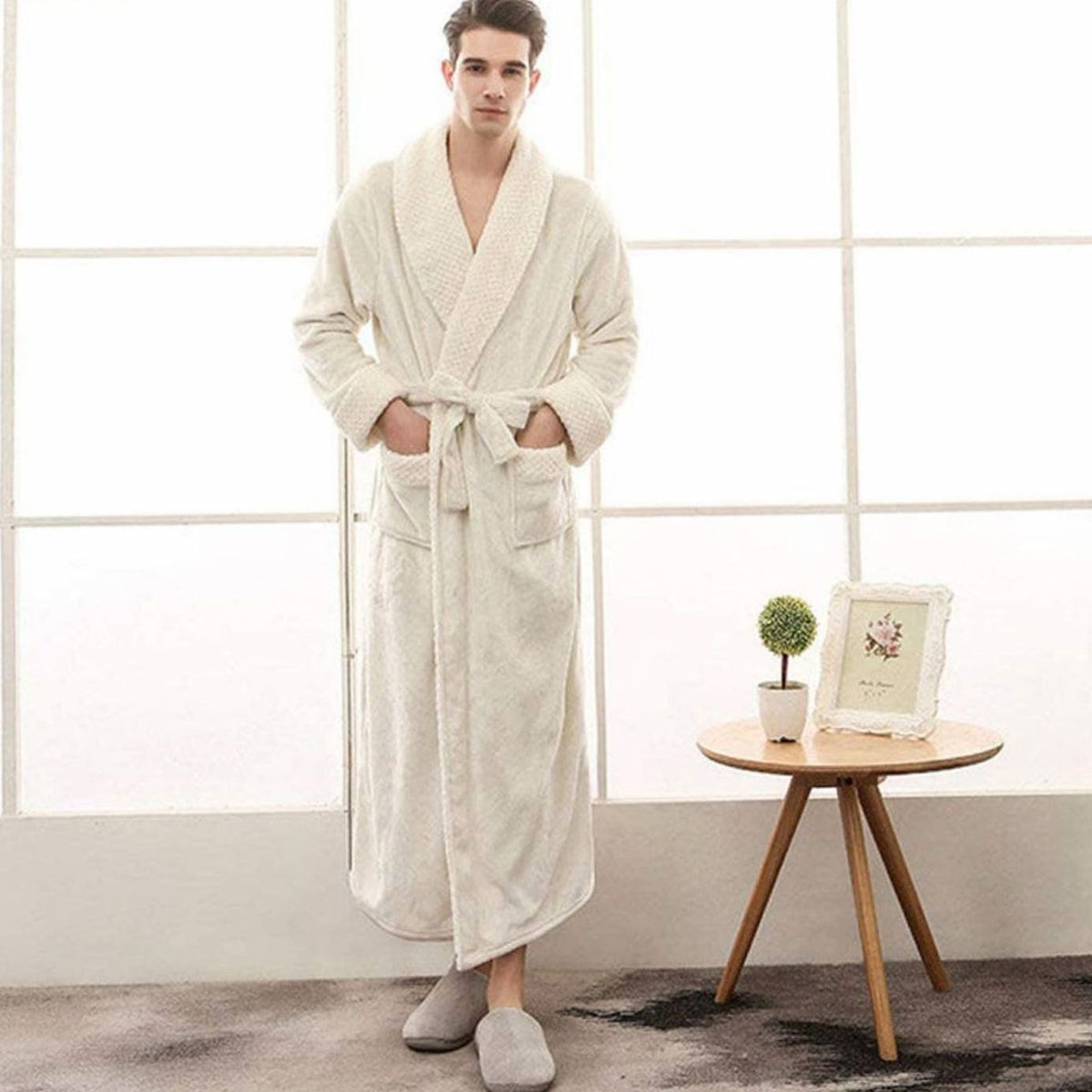 Women’s long plush fleece lounge robe by Homixa featuring an adjustable belt and two front pockets, perfect for cozy relaxation.