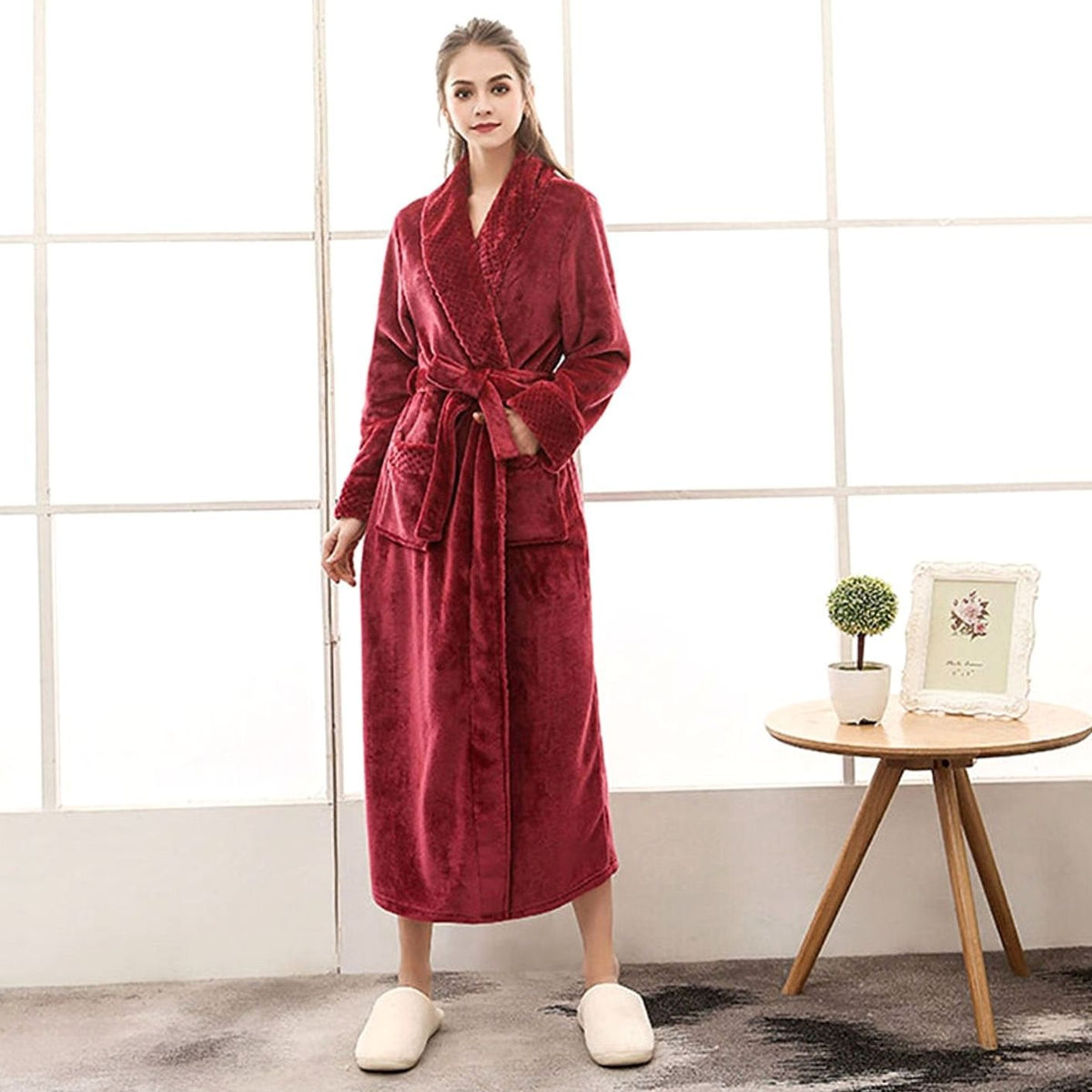 Women's plush fleece lounge robe by Homixa featuring an adjustable belt and two front pockets, designed for comfort and warmth.