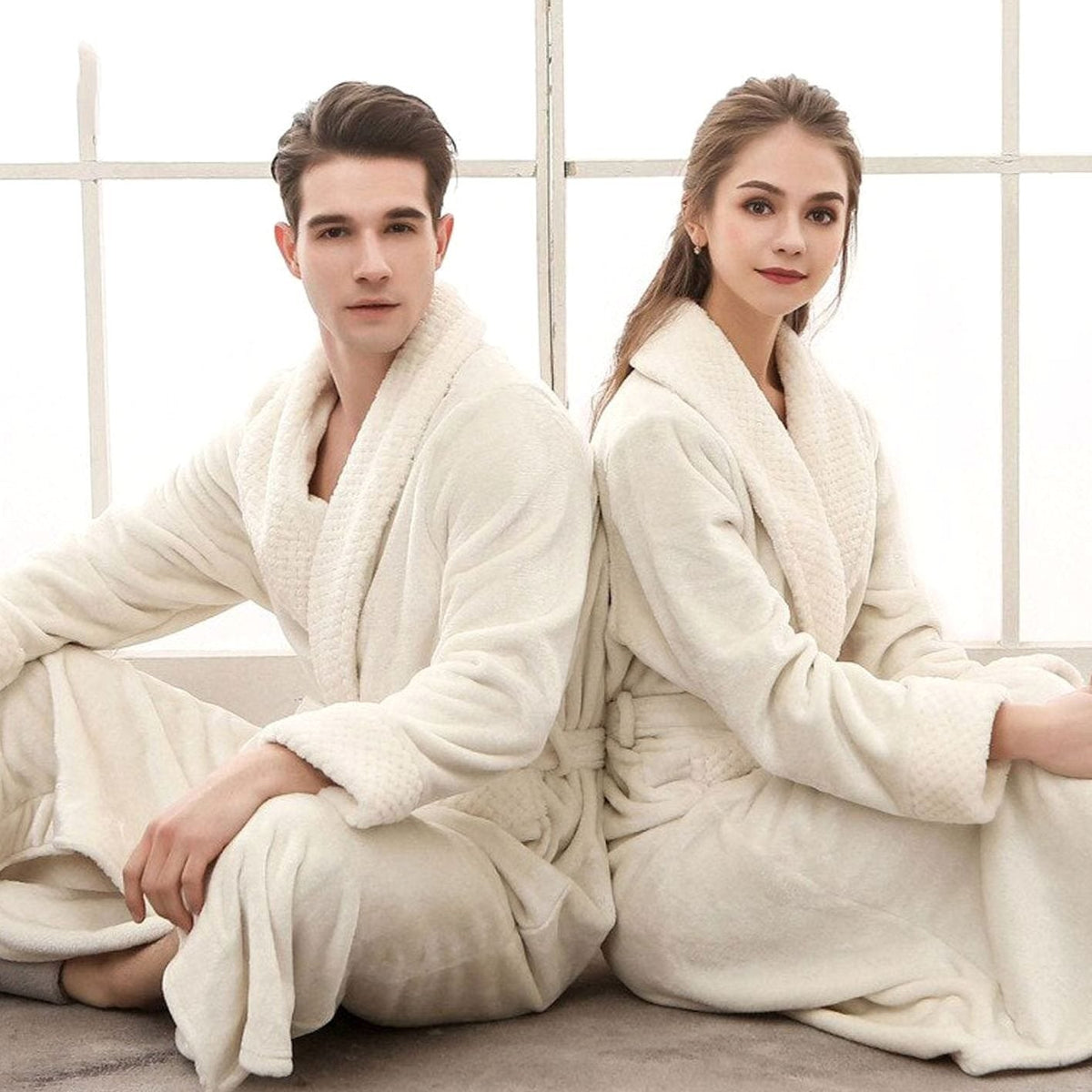 Women's long plush fleece lounge robe by Homixa with adjustable belt and two front pockets, soft and cozy for relaxing wear.